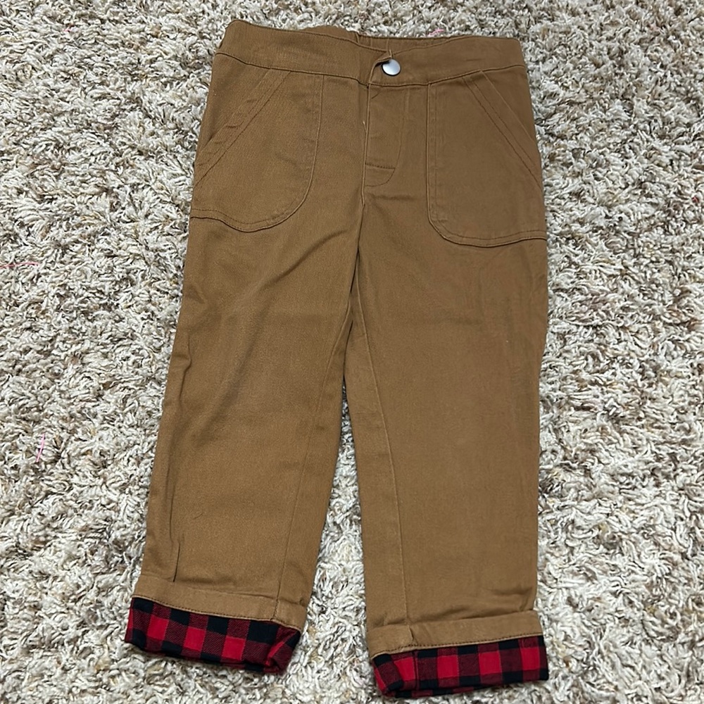 Brown pants with Buffalo plaid cuff